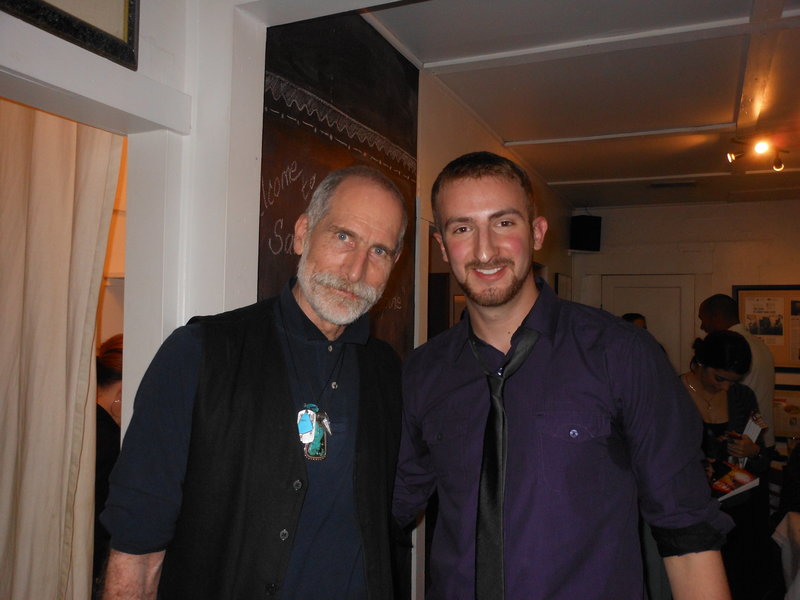 I'm on the right, with my professor, Dr. KV WIlt on the left.  He's an amazing poet; out of this world.  If I can get him to let me, I'll post one of his poems in the Lounge sometime.  No that isn't sweat under my armpits.  Just a shadow. :O