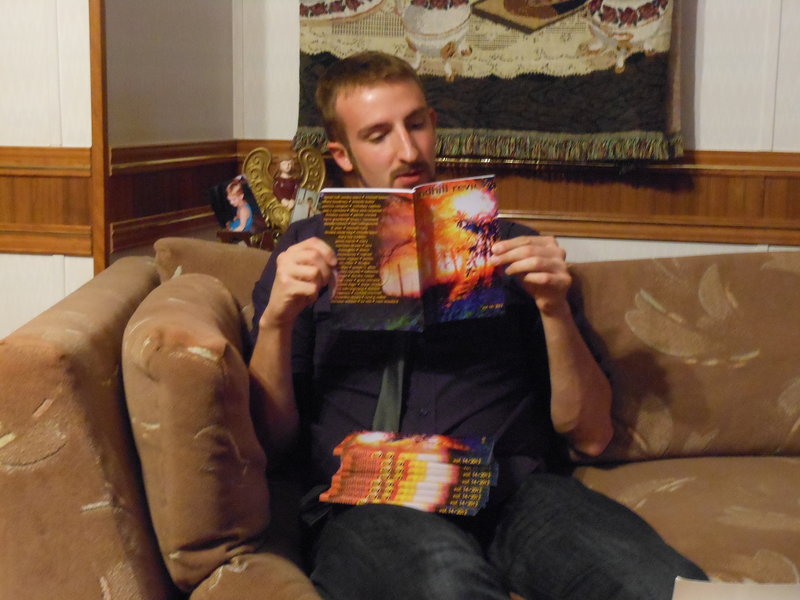 This actually isn't a staged picture.  I'd just gotten home and was reading some stories in the magazine when my friend snuck the picture.